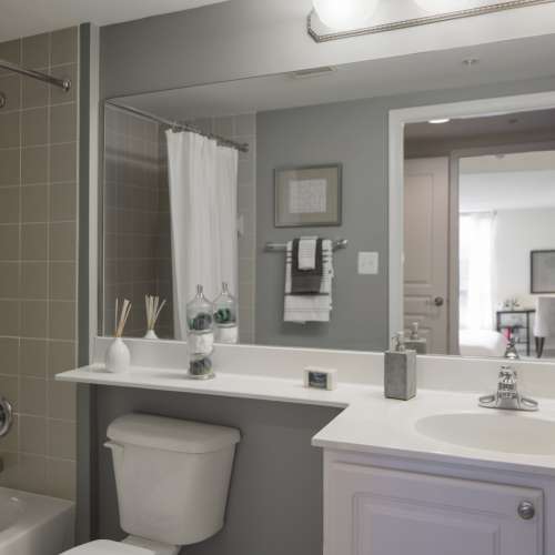 Original bath with added counter space and stainless finishes
