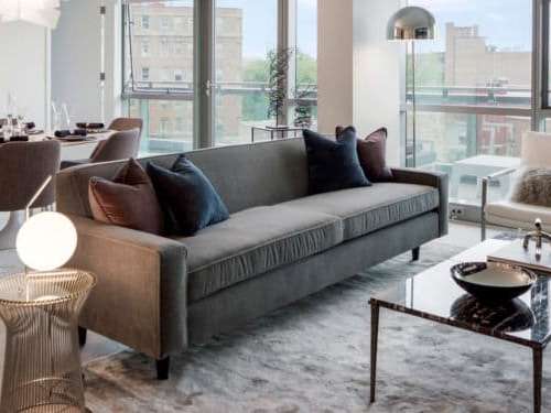 Curtain wall glass allows for a waterfall of light to frame a truly stunning living space.