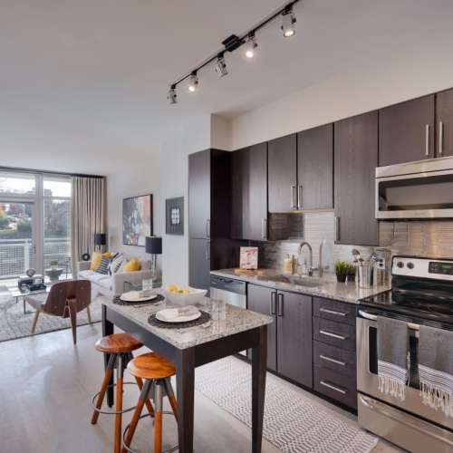 Stainless steel appliances make up this exquisite kitchen.
