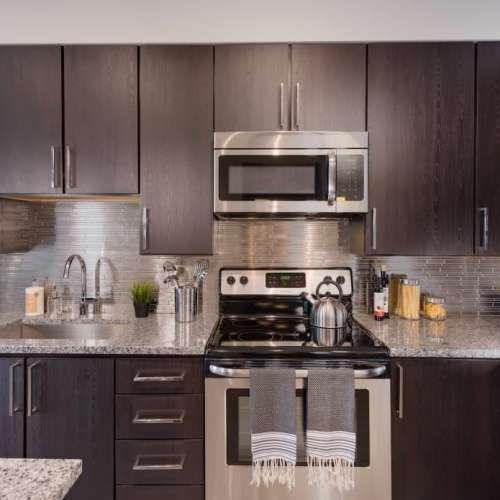 Beautiful granite counter tops with a matching island.