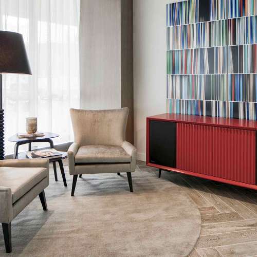 With sophisticated herringbone floors, the library can be for quiet conversation and study. 