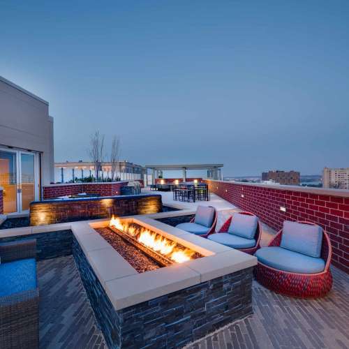 Keep warm by our rooftop fireplace.