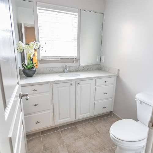 Bright bathrooms with extra-wide vanities 