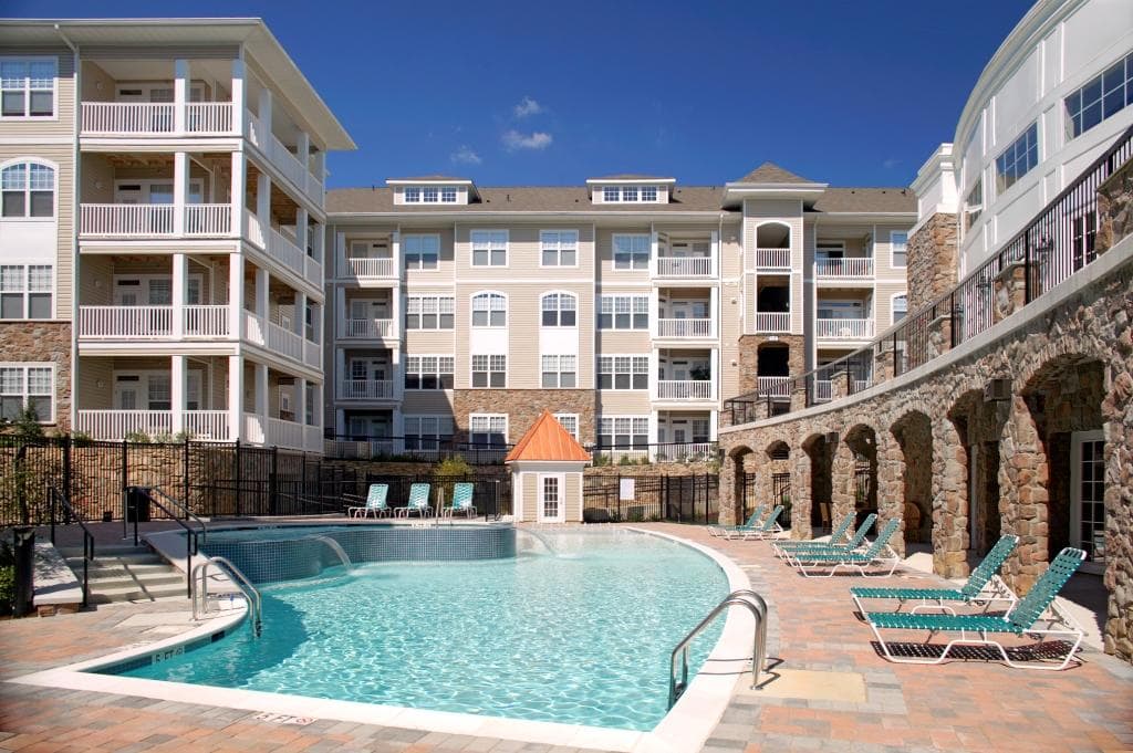 Stone Point Apartments : Cool off in the large pool with your friends