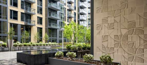 Enjoy bountiful green space in our half-acre courtyard with water feature, lighted path with seating, and sculptures by nationally renowned artist Barton Rubenstein.