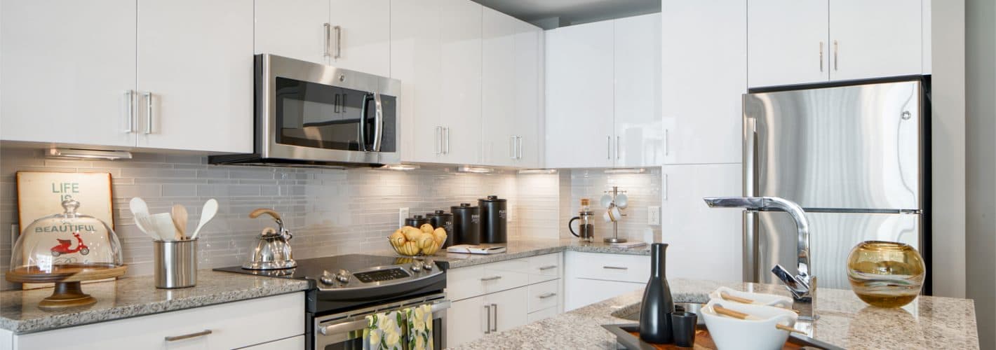 Insignia on M : Cook and entertain in our gourmet kitchens with stone countertops, glass-tile backsplashes, and stainless steel GE®  ENERGY STAR® appliances.