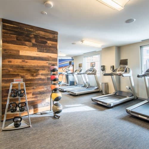 Strength train with weights or stretch out after a long workout in our streatching area. 