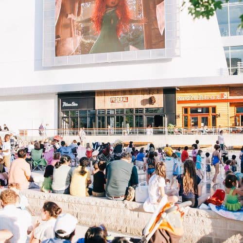 8Watch a movie on the lawn at Angelika Theater. 