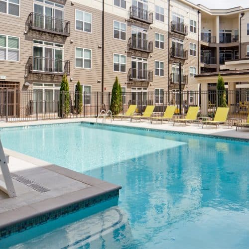 Resort-style outdoor swimming pool.