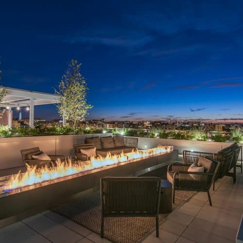 Cozy up by the rooftop fire pit.