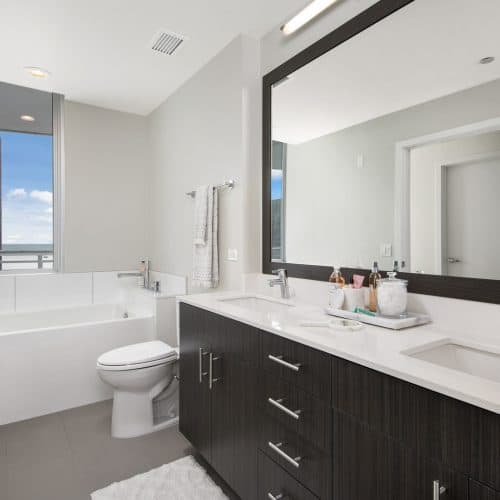 The bath in our 2 bedroom layout features double sinks and a soaking tub.