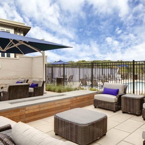 Enjoy a relaxing moment out by the pool lounge.