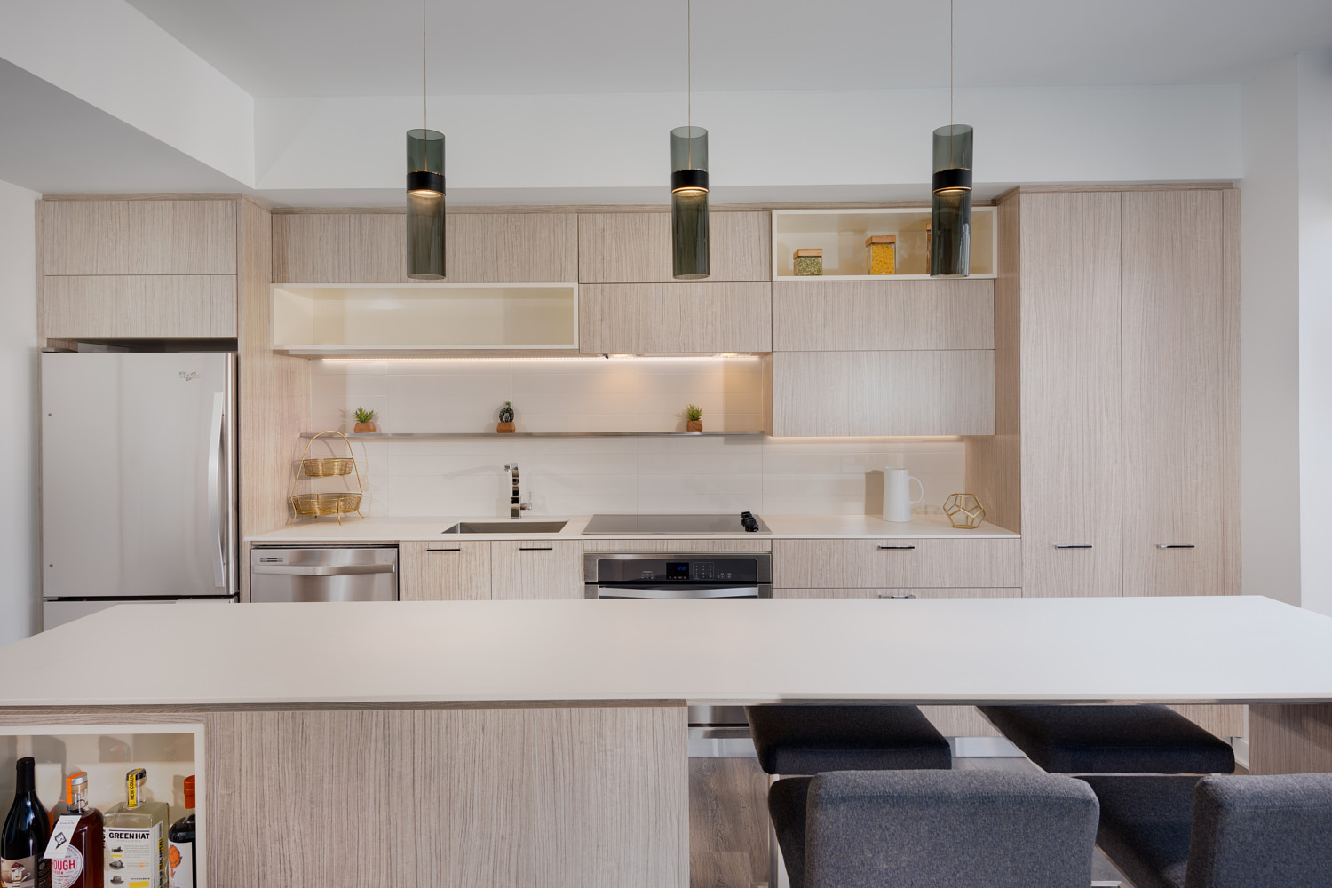 880P : Exquisite kitchens featuring Italian cabinets, Corian counter tops, and porcelain tile back splashes 