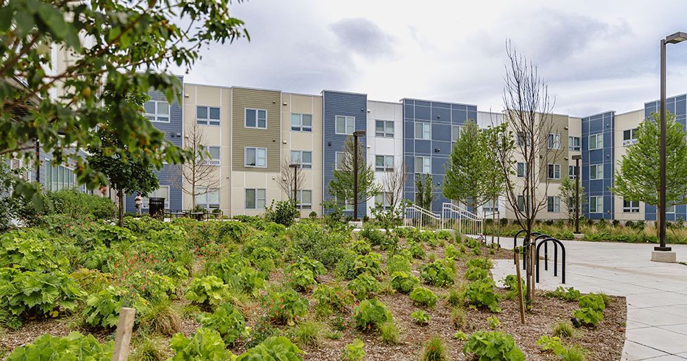 Ainger Place luxury apartment courtyard & building facade in Washington, DC.