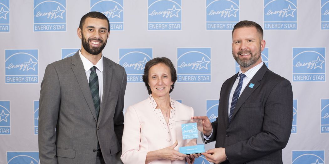 Bozzuto representatives accepting the 2022 Corporate Impact Award by So Others Might Eat (SOME).