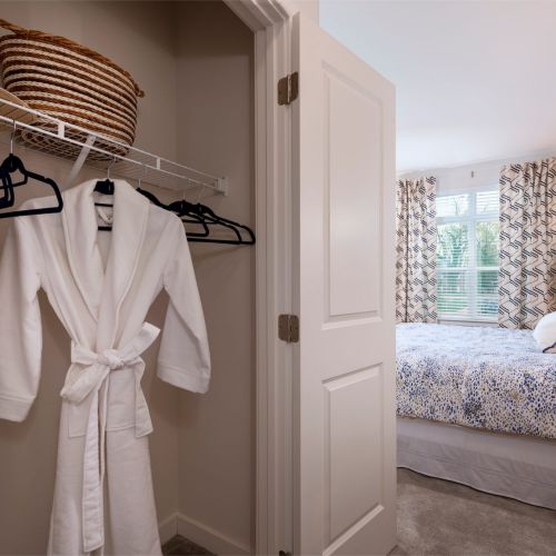 Convenient closet space connects to yoru en suite bath.