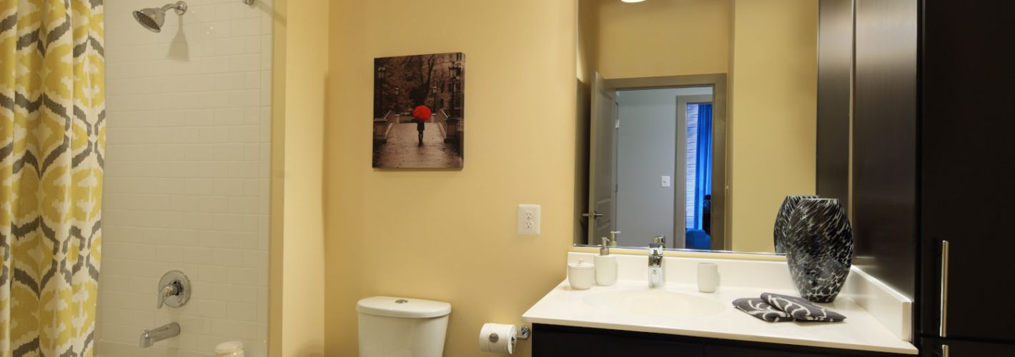 Union Wharf Apartments : Luxurious bathrooms with stylish subway tile backsplash.