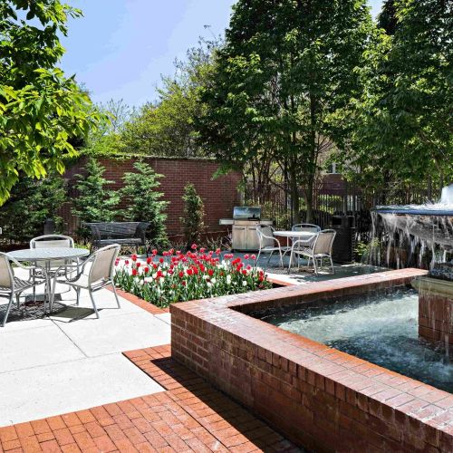 Escape to a private courtyard with grills and fountain