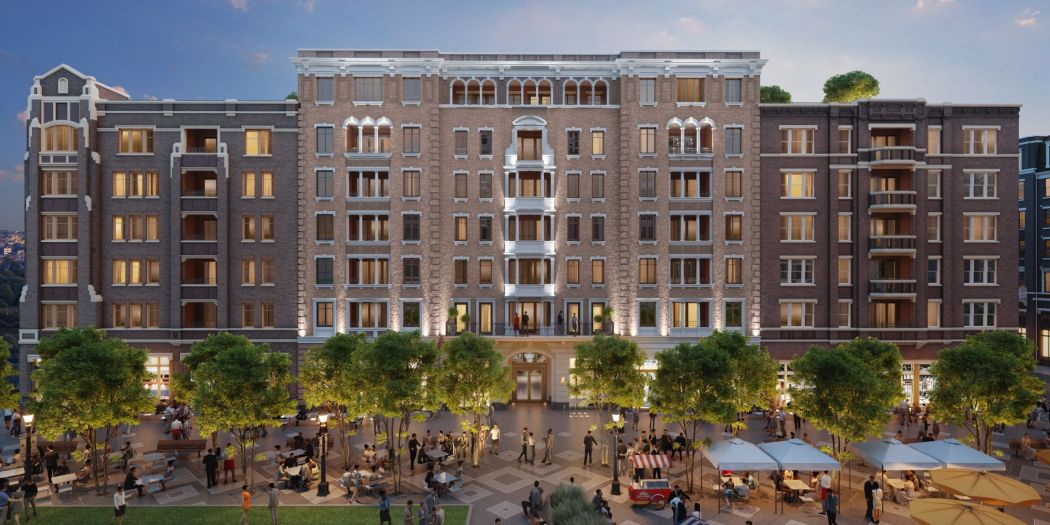 A Bozzuto luxury apartment building view with sleek design and large windows.