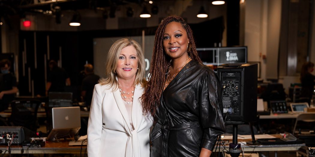 Bozzuto executives Julie Smith & Stephanie Williams in a recording studio