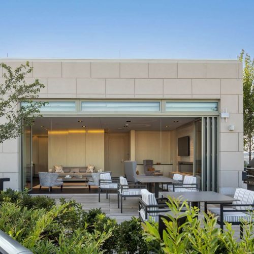 Entertain with friends, grilling on our rooftop while overlooking D.C.