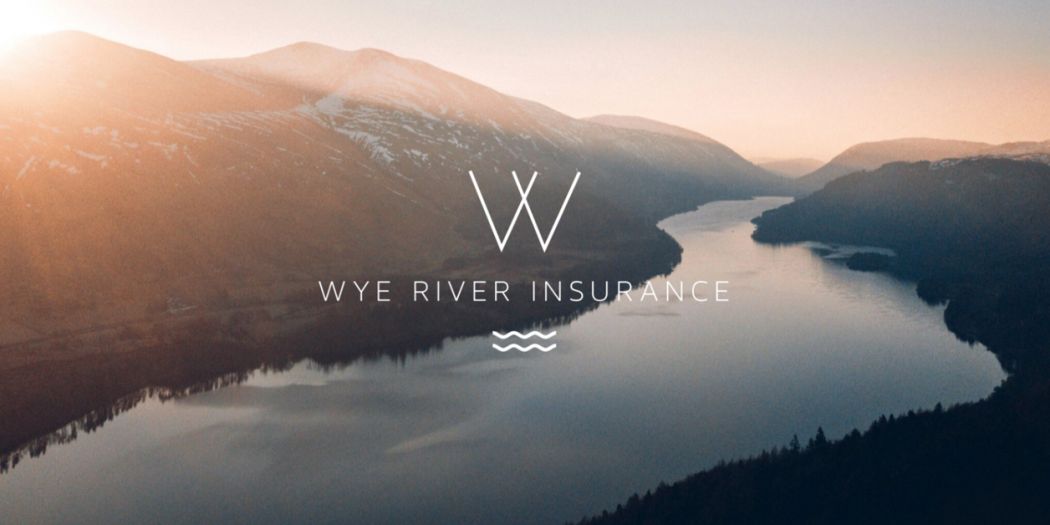 Wye River Insurance text & logo amidst a backdrop of a river flowing gently through a lush green landscape.