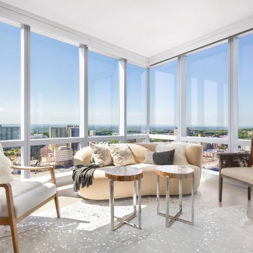 Living room with floor to ceiling windows
