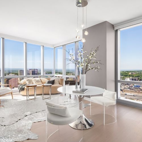 Living room with floor to ceiling windows