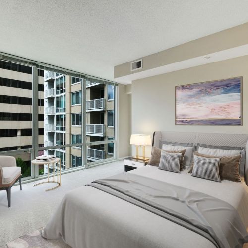 Bedroom with floor to ceiling windows