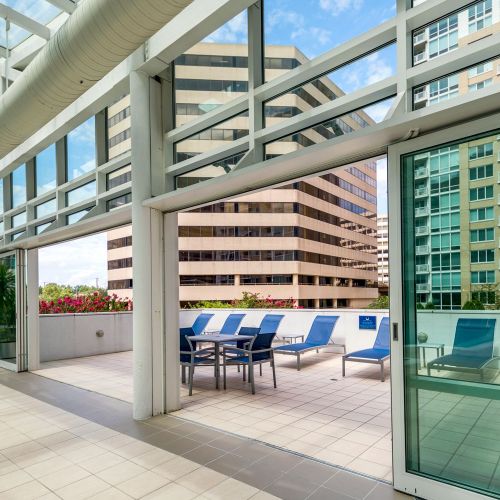 Outdoor pool desk with lounge seating