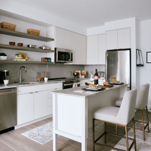 The Abby's kitchens feature brand new stainless steel appliances from Moen.