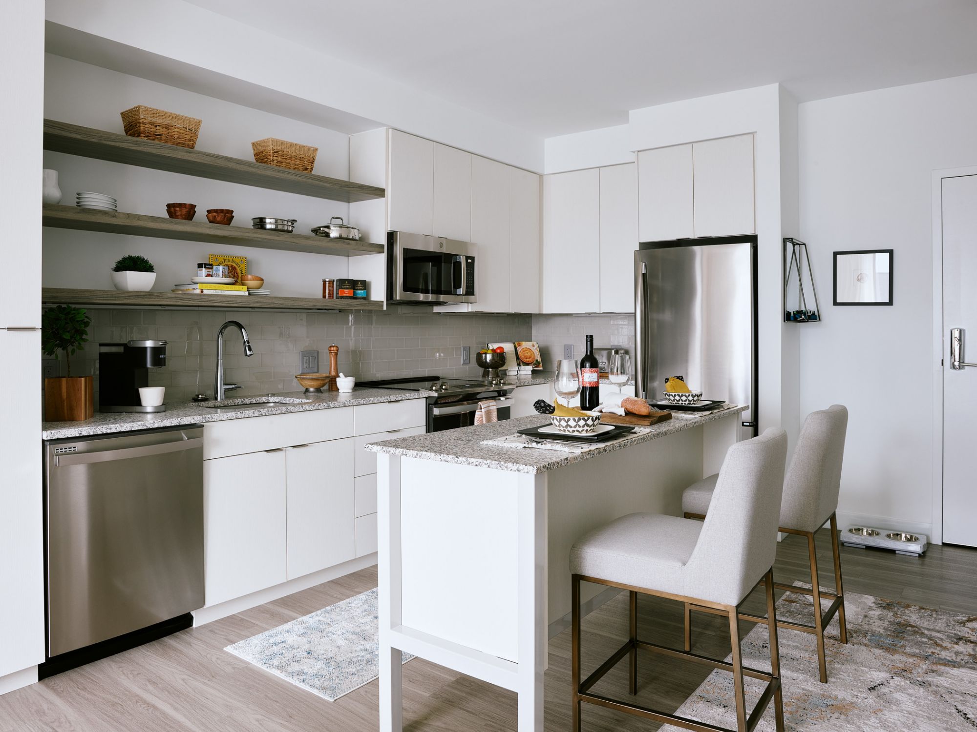 The Abby : The Abby's kitchens feature brand new stainless steel appliances from Moen.