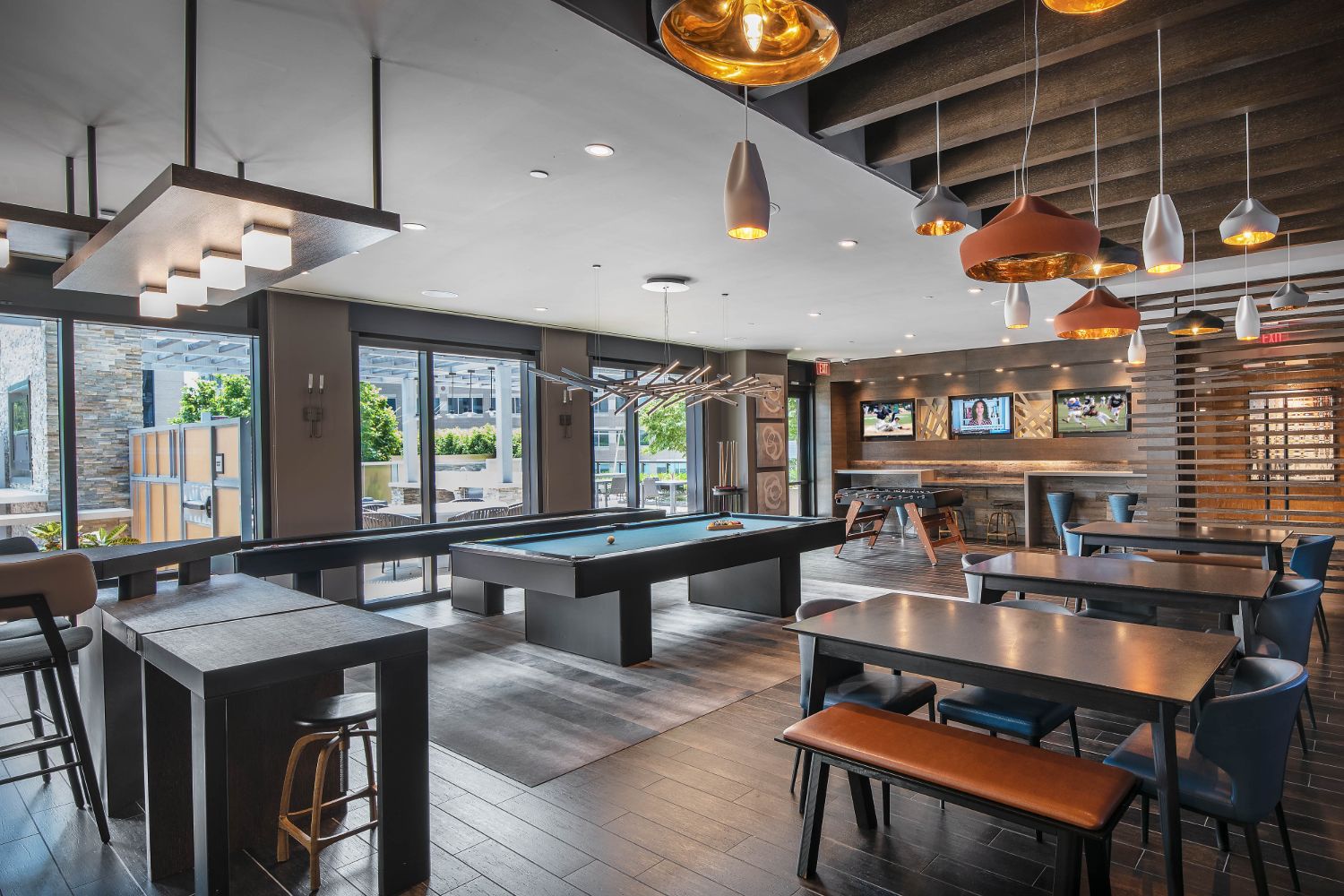 Signature : The ultimate hangout with HDTV sports wall, kitchen, billiards, shuffleboard, and foosball