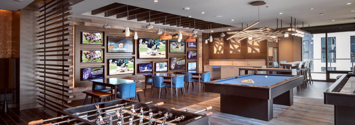 Signature at Reston Town Center : Relax and kick back in clubroom with HDTV sports wall, kitchen, billiards, shuffleboard, and foosball