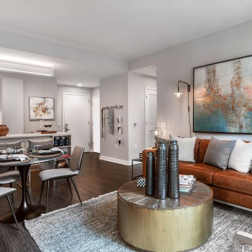 Bright, spacious open-concept floor plans with pendant lighting and hardwood flooring throughout