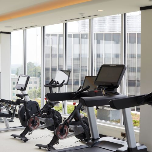 Ready to elevate your workouts? The rooftop fitness center awaits. 