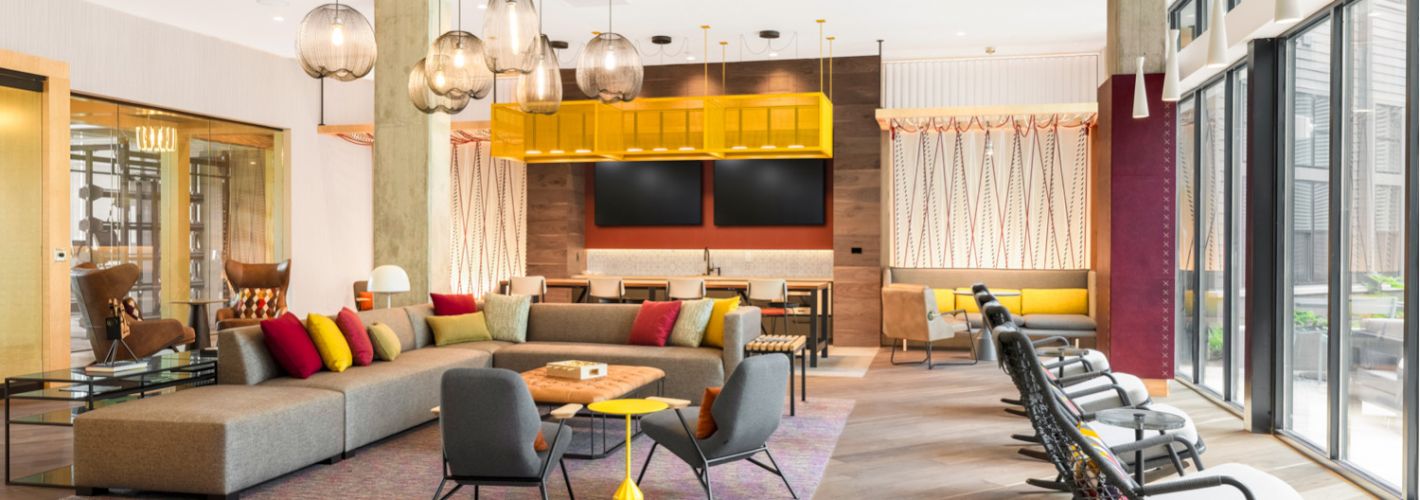 The Chase at Bryant St : The Chase clubroom offers both expansive social spaces and cozy seating