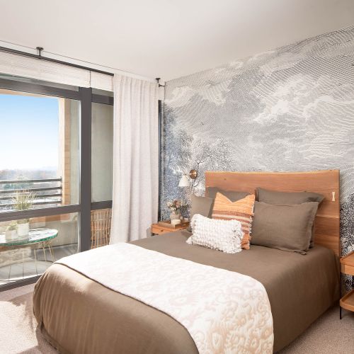 Wake up to panoramic floor-to-ceiling views overlooking the city of Arlington. 