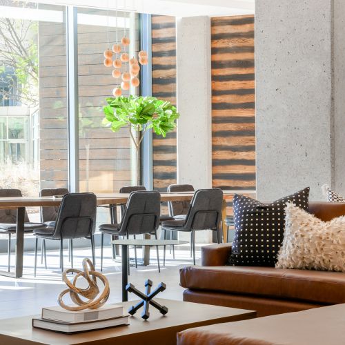 A grand lobby boasting lofty ceilings and sweeping natural lighting