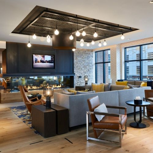 Enjoy our cozy lounge by the fireside.