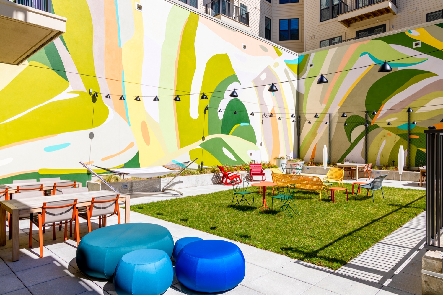The Vale : Hang out and snap a selfie in front of our colorful courtyard mural. 
