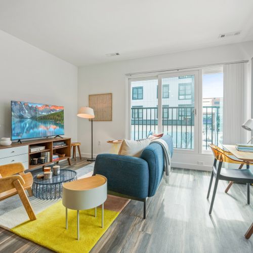 Full length windows and Juliet balconies allow endless natural light into Blvd & Bond apartment homes.