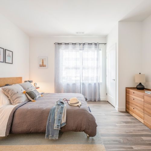 Large windows that make your spacious bedroom bright.