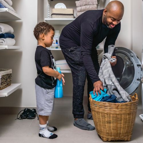 Walk-in laundry rooms with full size washers and dryers