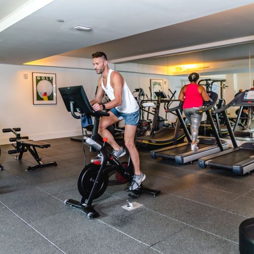 Cutting-edge fitness center featuring Peloton bikes