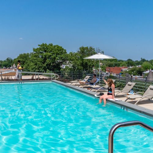 Ample poolside chairs for sunbathing