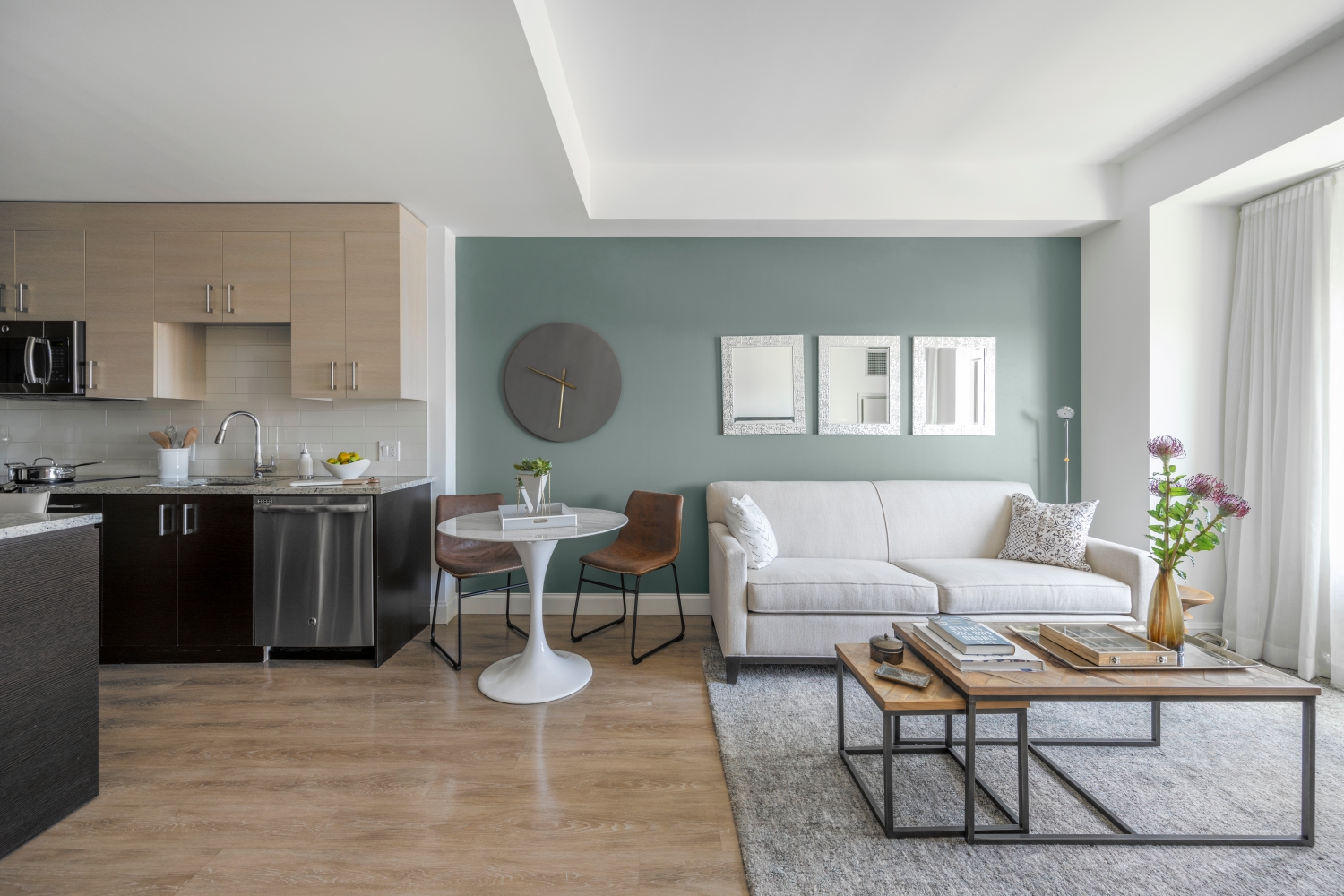 One Greenway :  Durable plank flooring throughout living, dining & kitchen areas