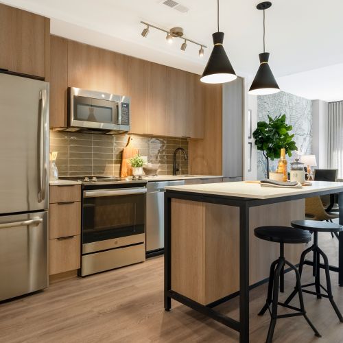 The Burton : Open kitchens with state-of-the-art appliances, contemporary cabinetry and pendant lighting