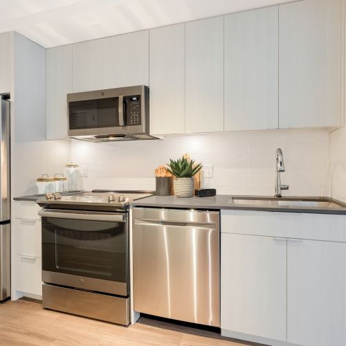 Modern kitchens with stainless steel appliances and prep islands