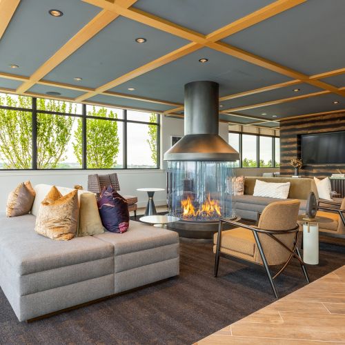 Sophisticated roofttop clubhouse featuring a large fireside lounge